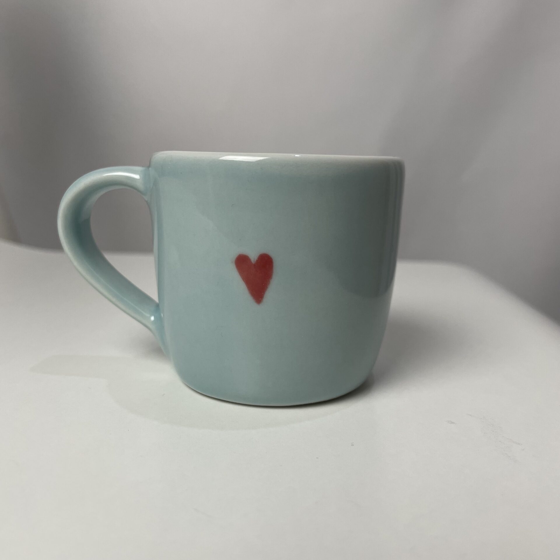 Světle modrý hrnek porcelánový srdíčko 80 ml - Darouge Světle modrý hrnek porcelánový srdíčko 80 ml - Darouge